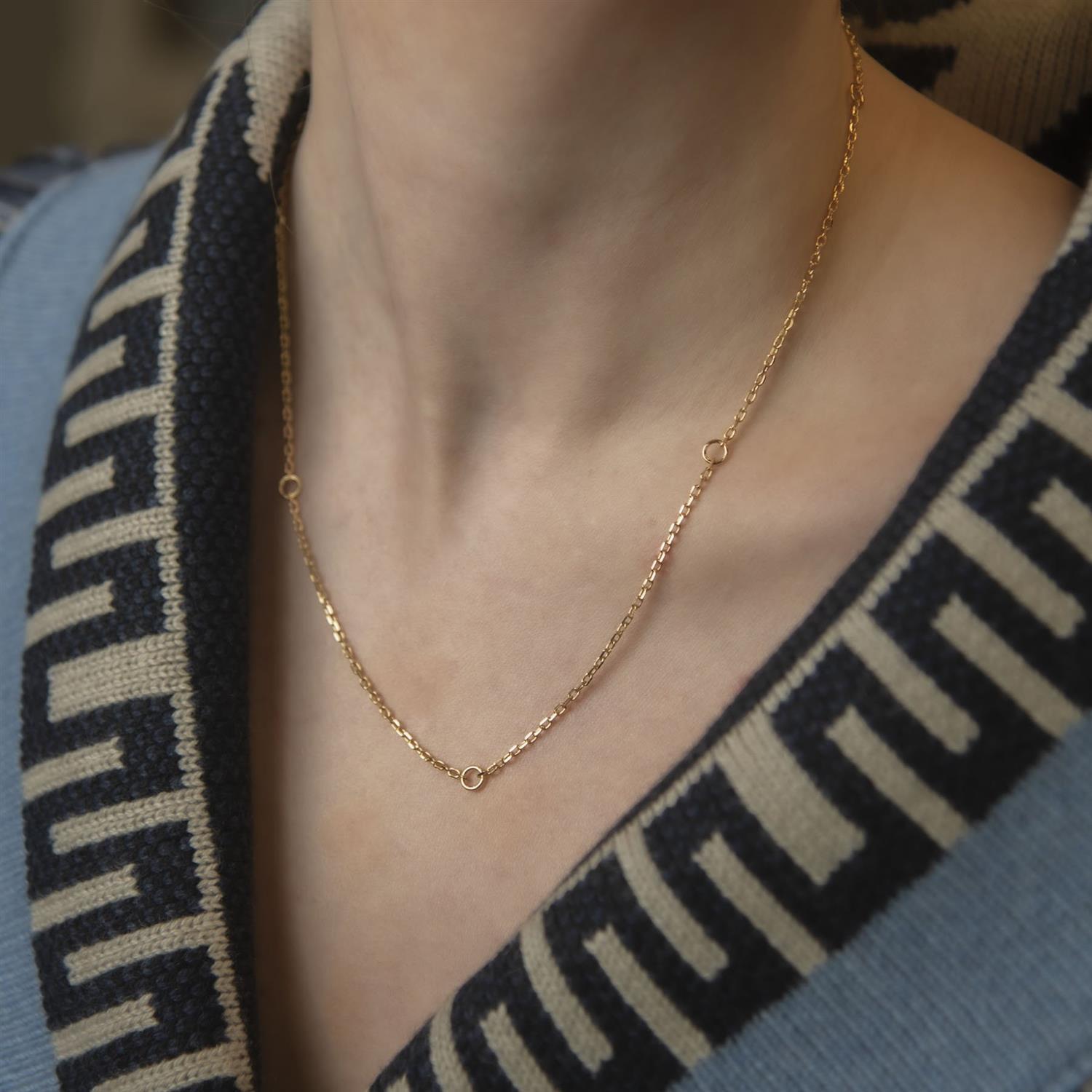 GOLD NECKLACE WITH RINGS
